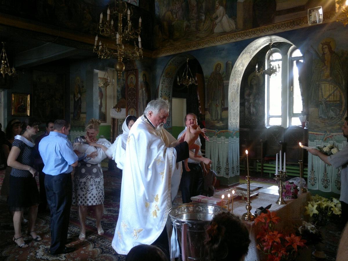 Oficierea Tainei Sfântului Botez